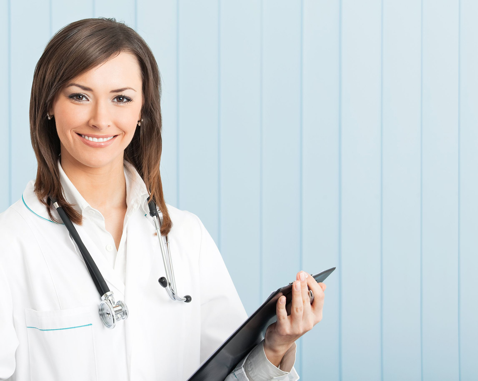 nurse smiling with clipboard